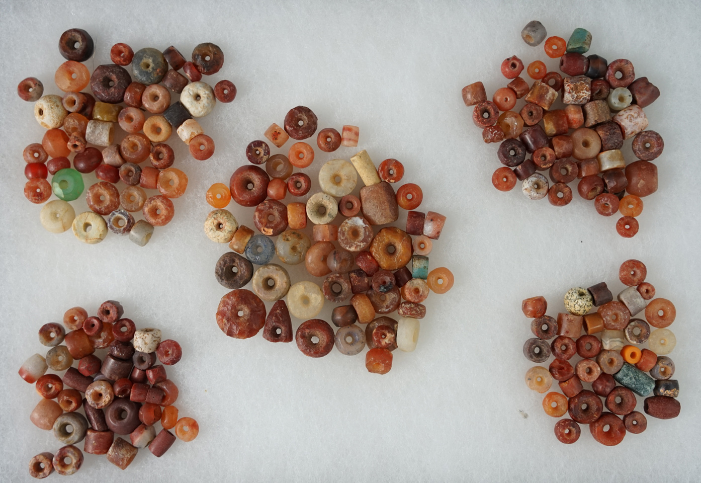 Large group of beautiful drilled ancient quartz beads recovered in Columbia, South America.