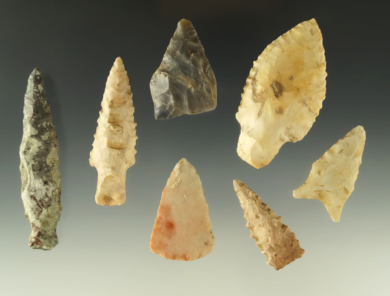 Set of seven assorted arrowheads from various locations, largest is 2 1/2".