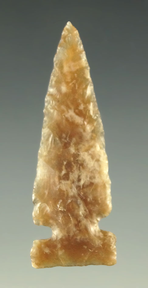 Incredible flaking on this well styled 1 7/16" sidenotch point found in the High Plains.