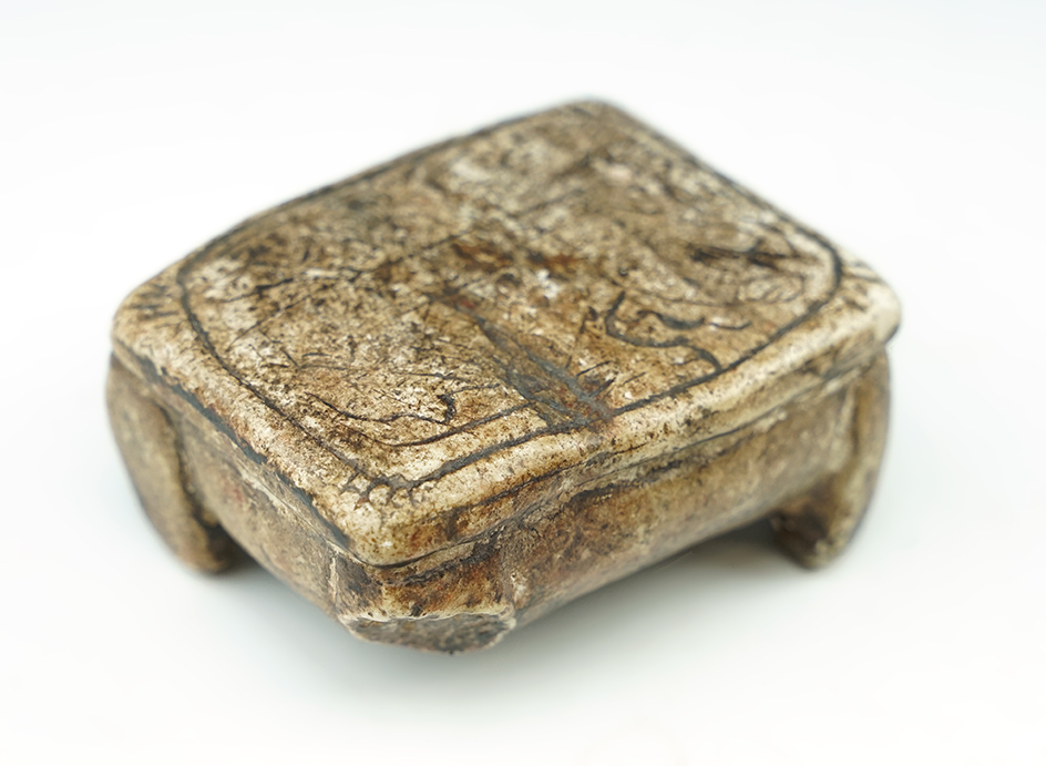 2 5/8" Long Carved Stone Four Leg Effigy that is heavily engraved, found in Peru.