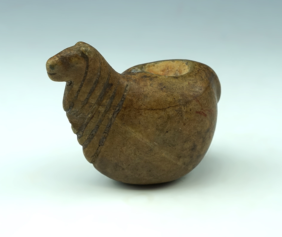 Nicely patinated 2 3/16" tall Alpaca Canopa found in Peru.