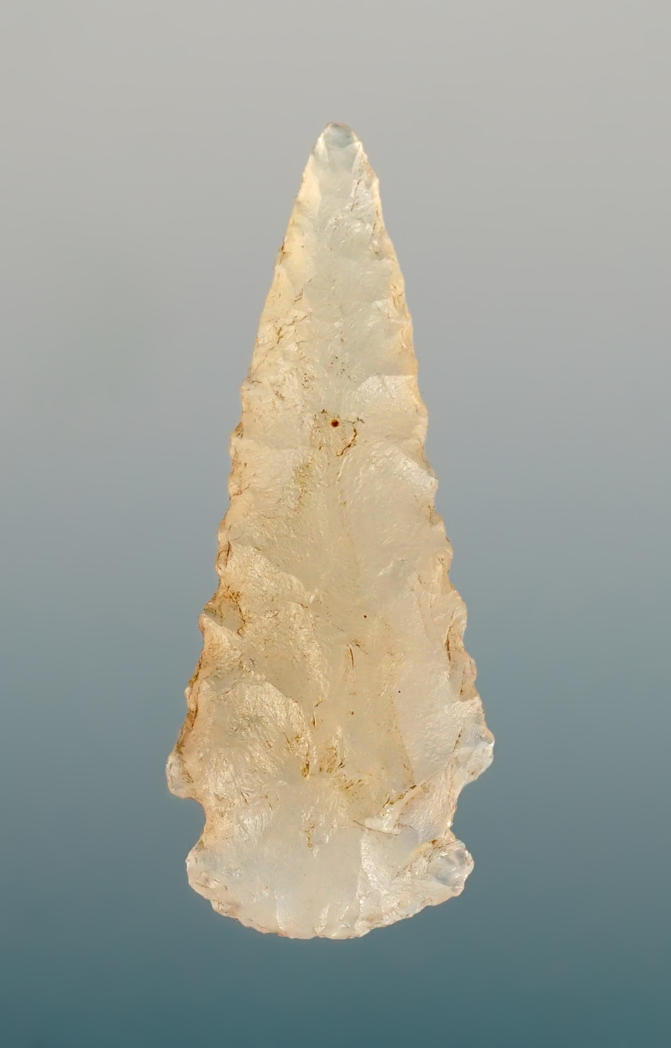Highly translucent 1 5/8" Corner Notched Dart point found in the Four Corners region.