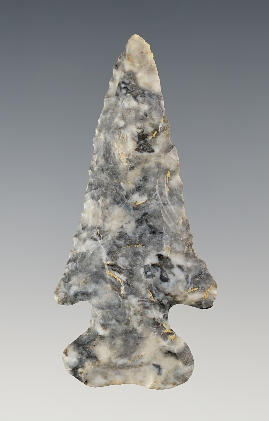 2 5/8" Archaic Bevel made from beautiful Coshocton Flint. Found in Muskingum Co., Ohio.