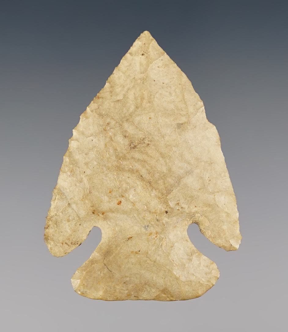 Well made 2 1/16" Ohio Thebes point with heavy ancient grinding to the basal area. Ex. Kenny McNeal