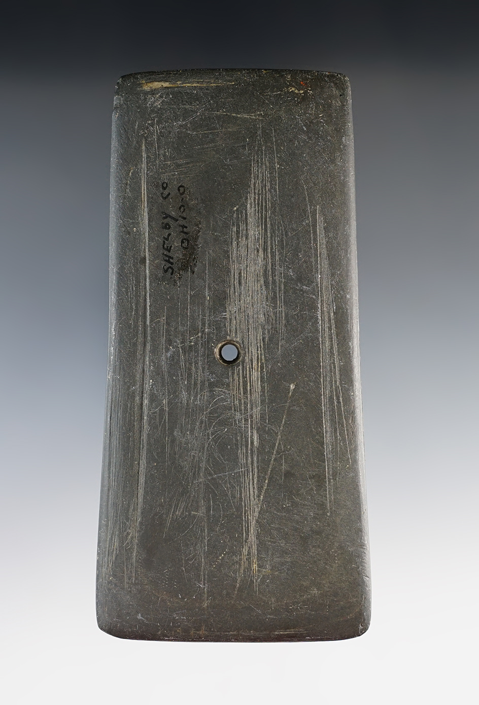 4 13/16" Hopewell Trapezoidal Pendant that is engraved on both sides, made from black Slate. Found i