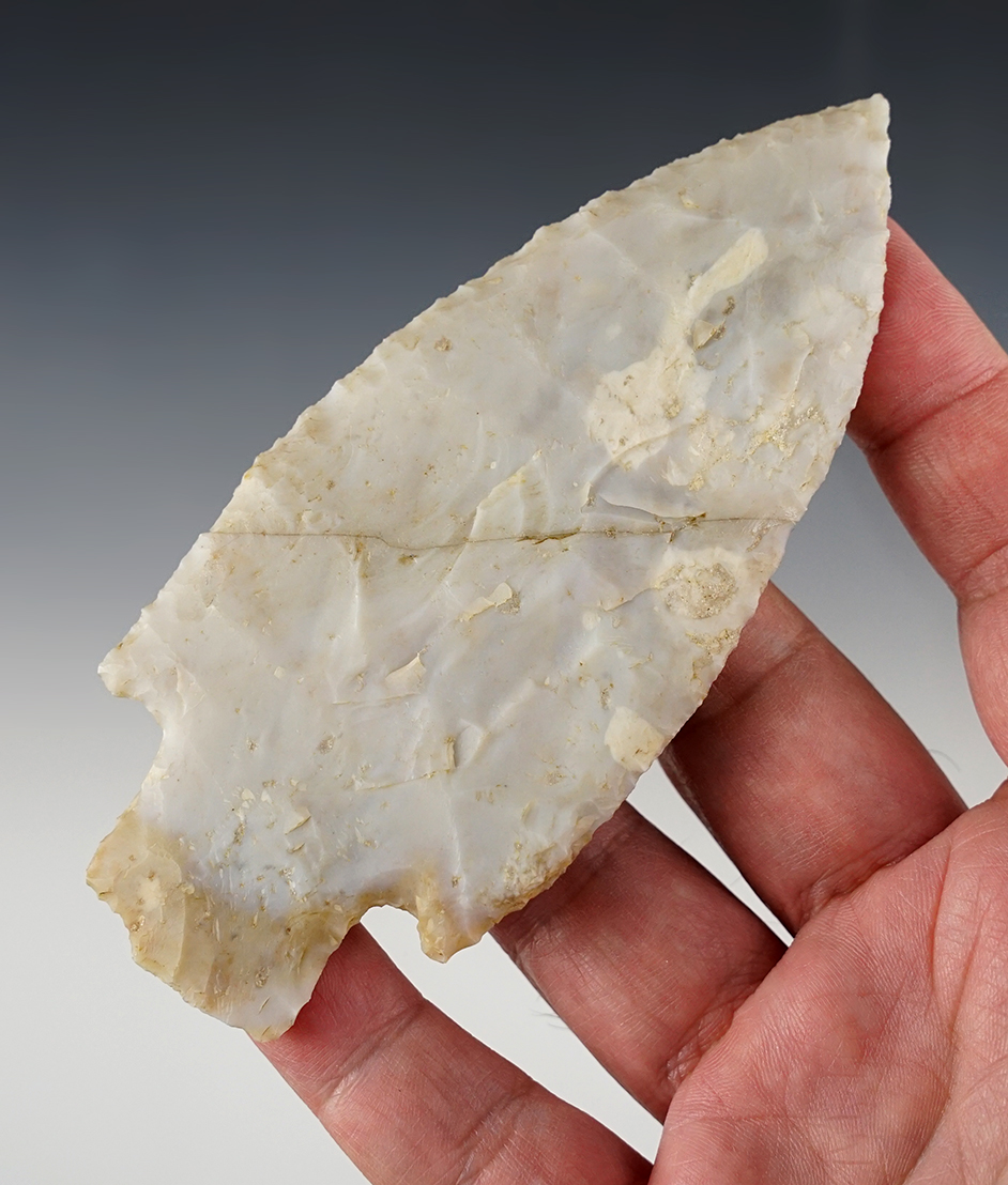 4 13/16" Flint Ridge Flint Adena that is broken and glued at the midsection. Delaware Co., OH