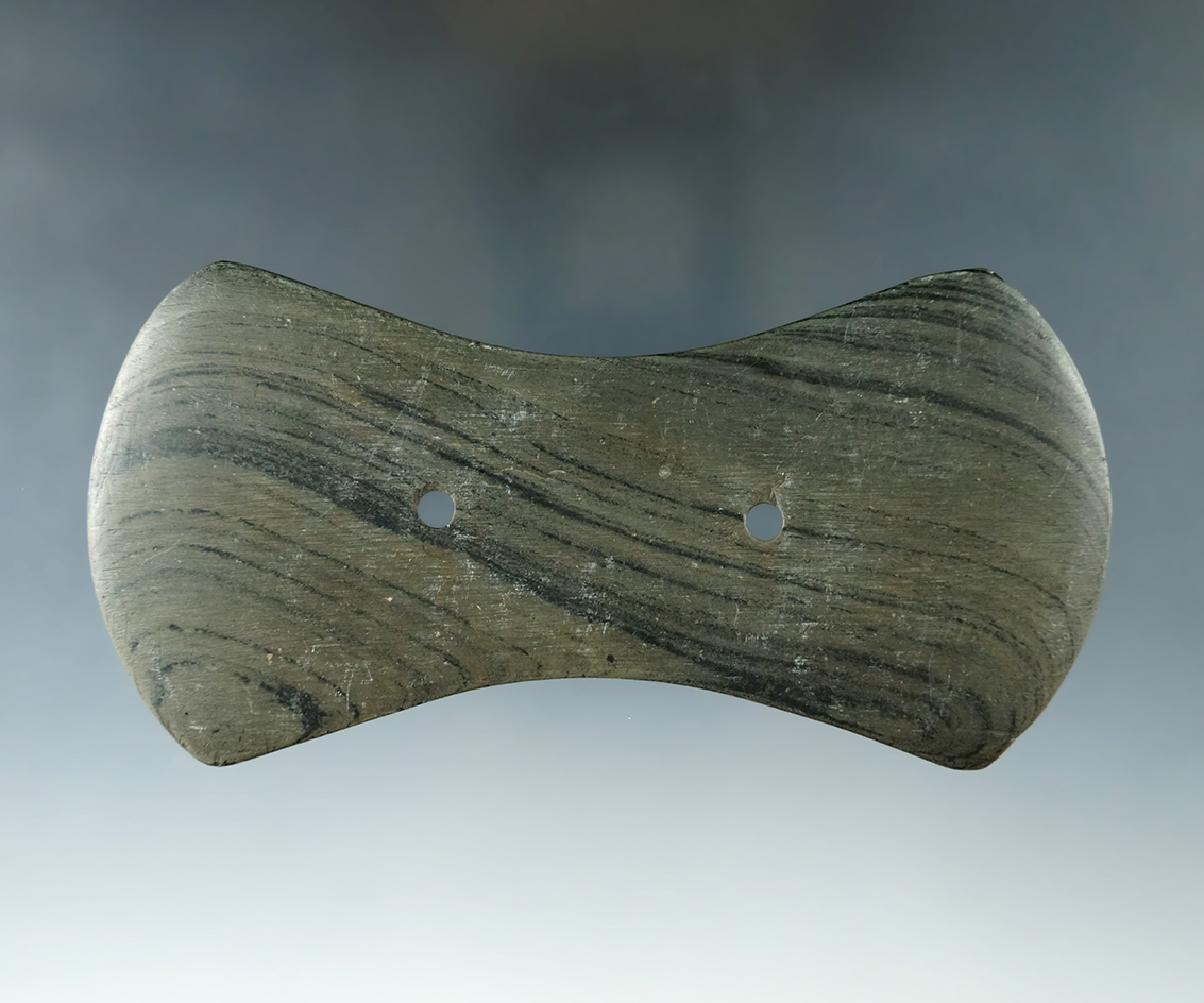 Thin and very nicely styled 4 11/16" Adena Bi-Concave Gorget found in Pickaway Co., Ohio. Pictured.