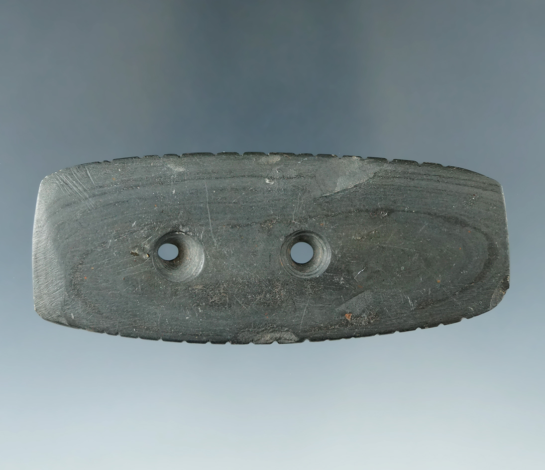 3 5/16" Banded Slate Gorget that is heavily tallied on two sides, found in Ohio.