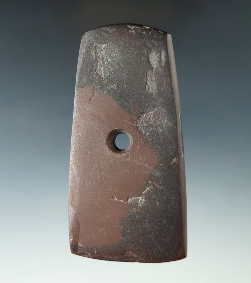 4 3/16" Adena Trapezoidal Pendant made from red and black Slate, found in Erie Co., Ohio. Ex. Hovan.
