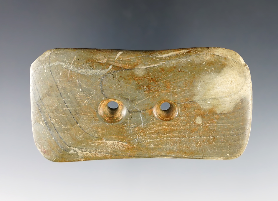 Heavily patinated 3 1/2" Banded Slate Biconcave Gorget found in Ohio.