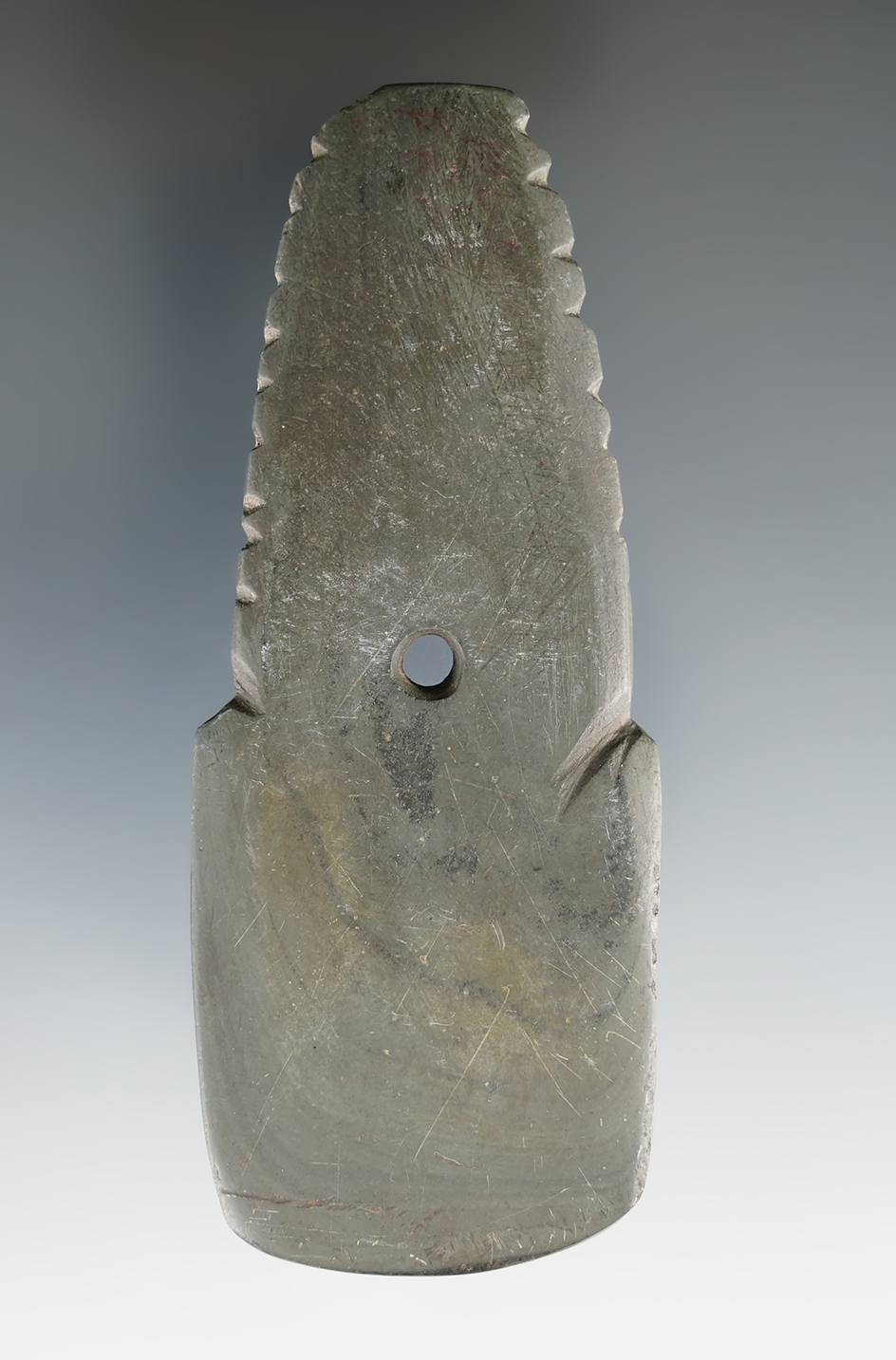 3 11/16" Hopewell Shovel Pendant that is notched and tallied, found in Franklin Co., Ohio.