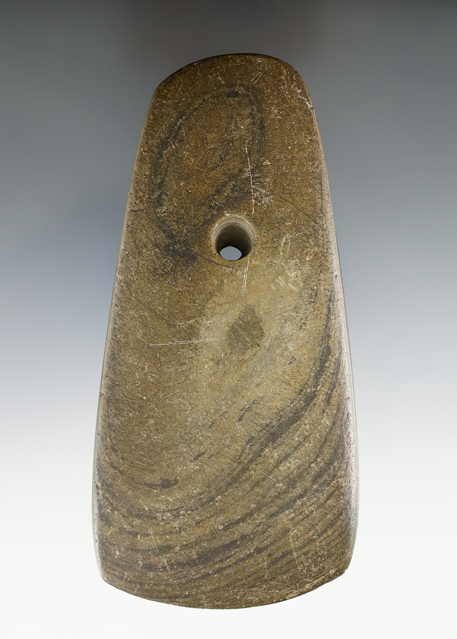 4 9/16" Adena Trapezoidal Pendant made from green and black Mottled Slate, found in Ohio.