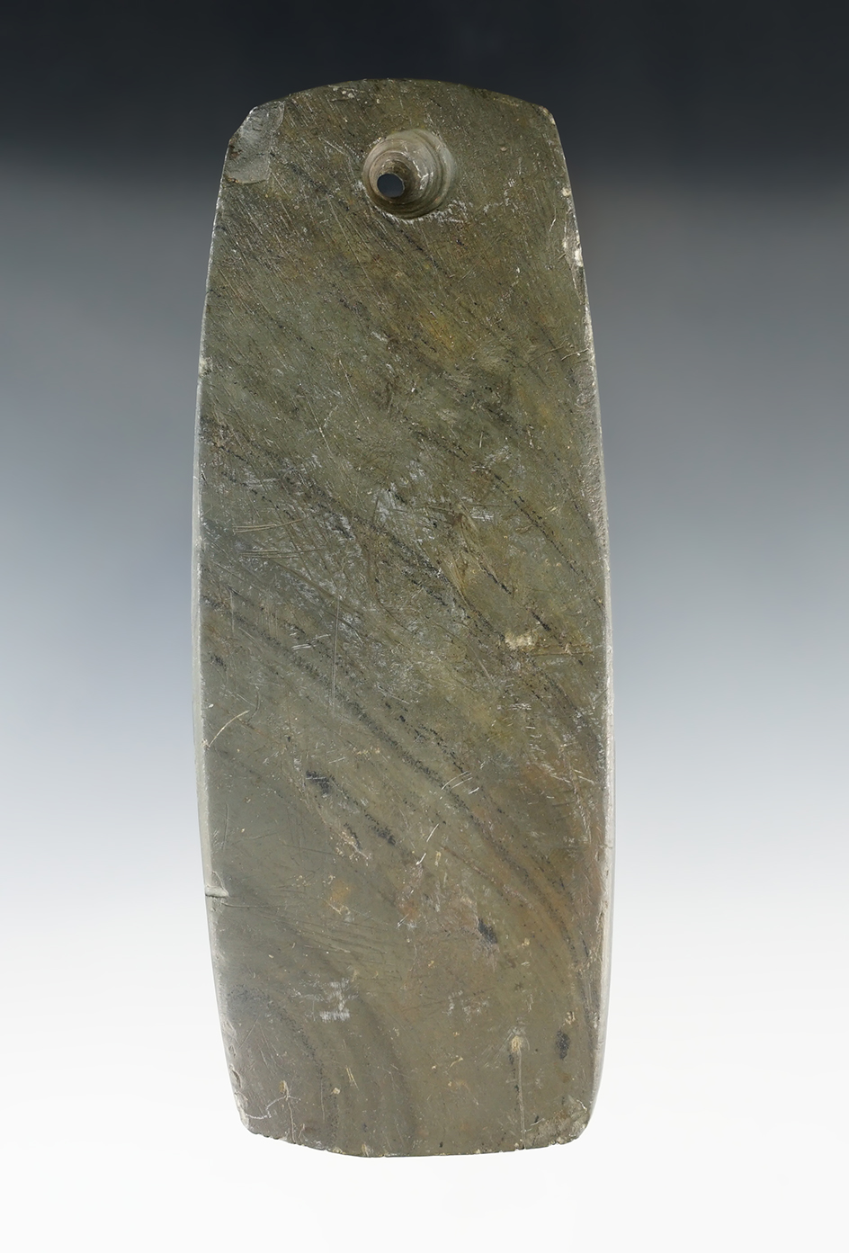 5 5/8" Adena Trapezoidal Pendant. Found in 1977 in the vicinity of Fox Lake, Wayne Co., Ohio.