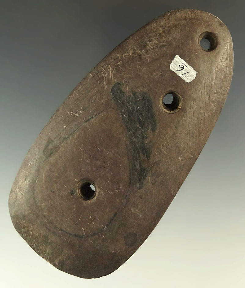 4 9/16" Three Hole Ovate Gorget found in Huron Co., Ohio. Ex. John Montel, B. B. Thomas.