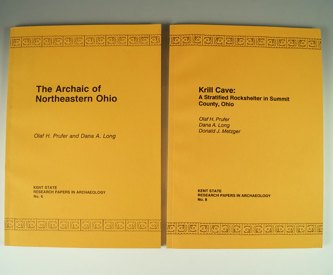 Pair of research papers in archaeology.