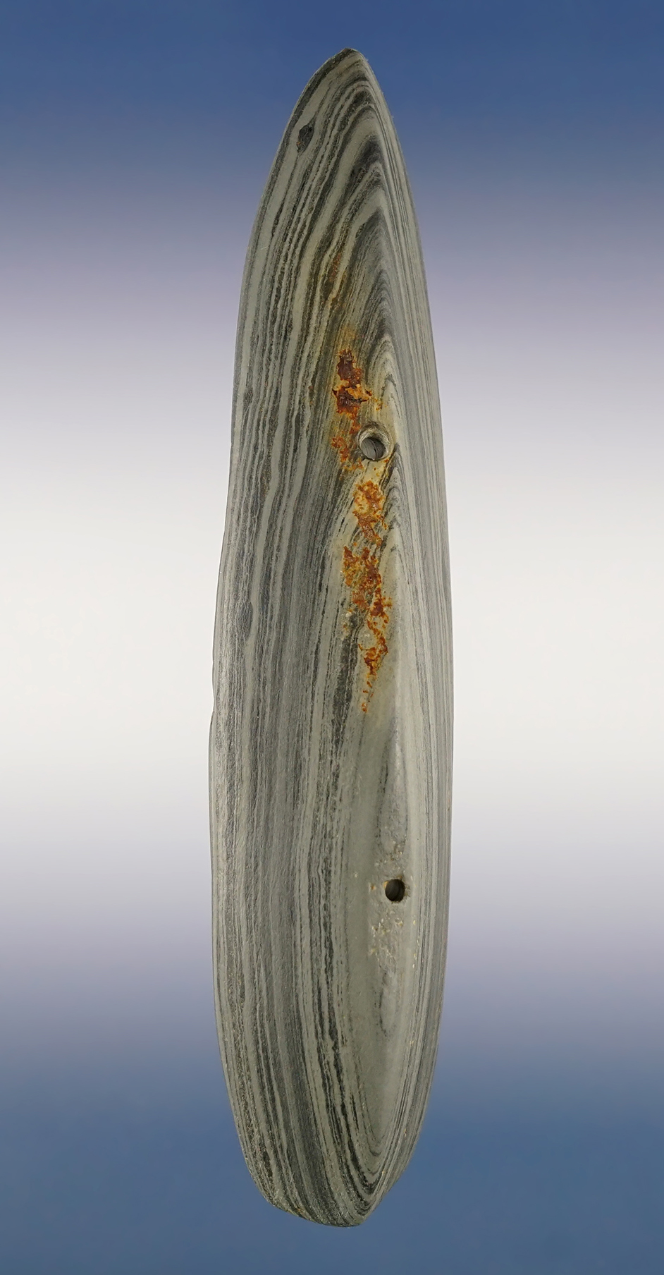 Exceptionally well styled 6 1/8" Adena Ridged Gorget. Heavily cleaned but displays well.  Ohio. 