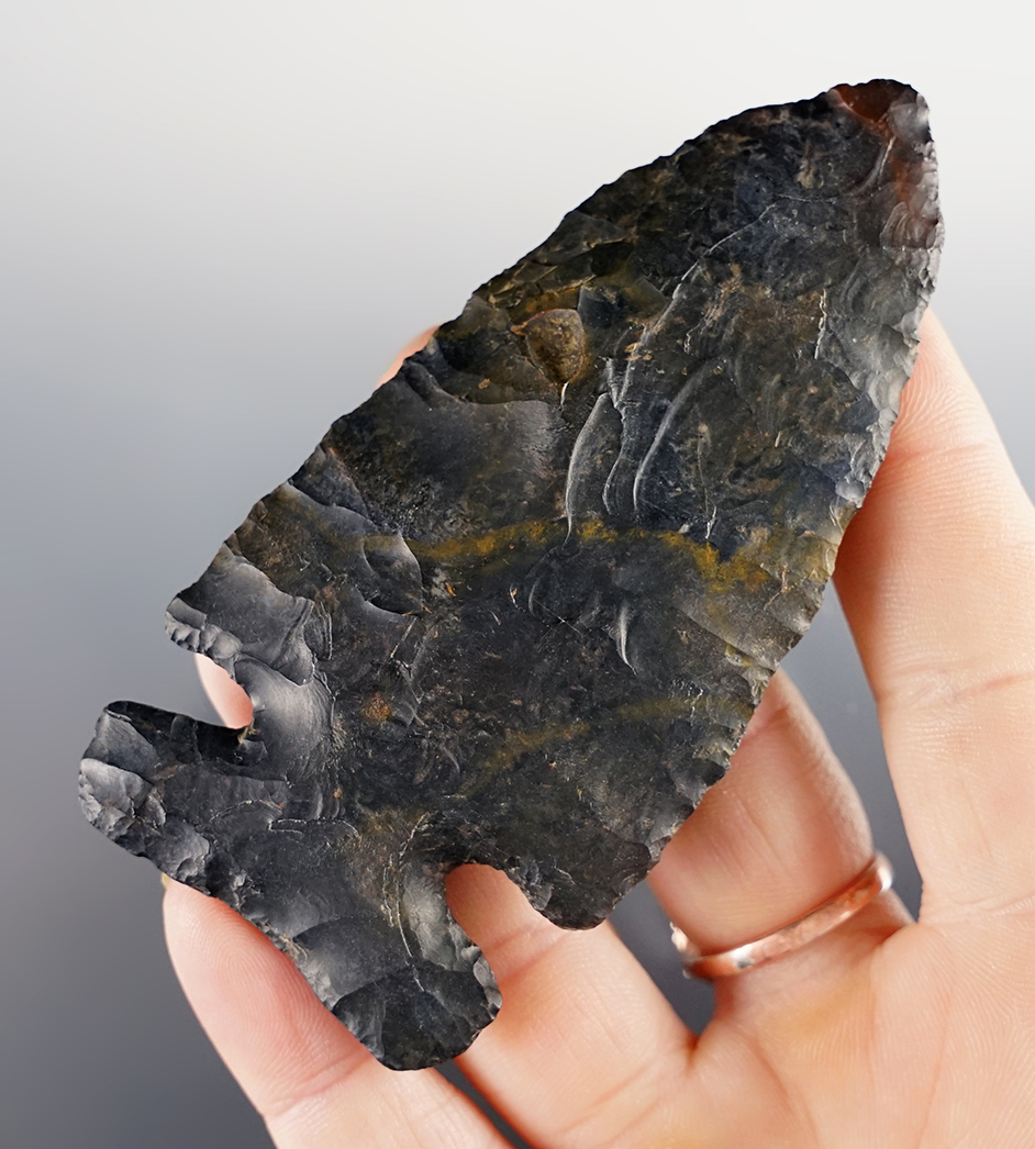 3 1/2" Archaic Sidenotch made from Coshocton Flint with a red tip. Found in Morrow Co., Ohio. 