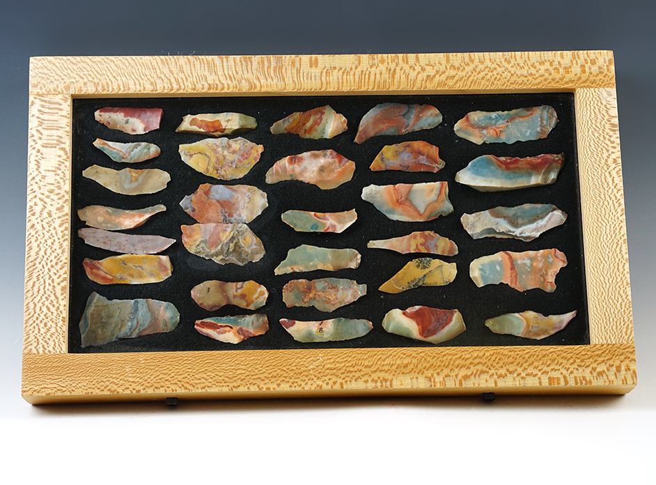 Frame of 30 Hopewell Flake Knives and worked Tools made from highly colorful Flint Ridge.