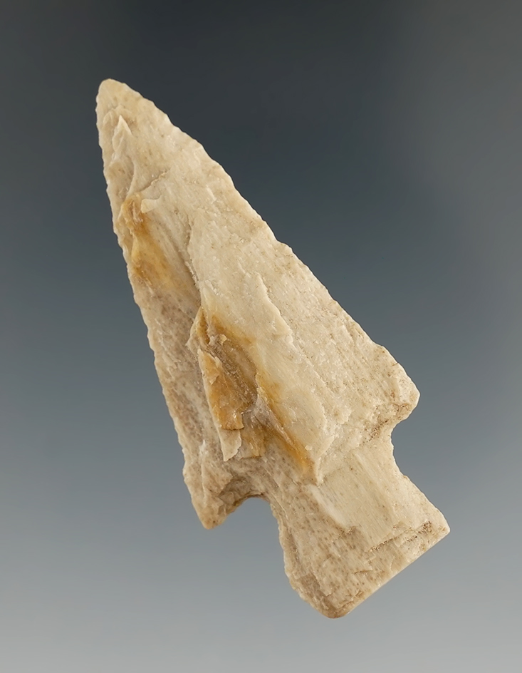 2 5/16" stemmed point made from petrified wood found in Texas.